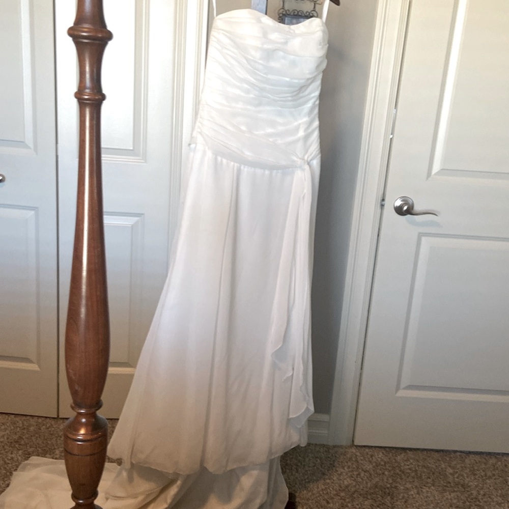 Allure Bridals wedding gown. Ivory. Strapless. Rouching style. Zip. Bustle